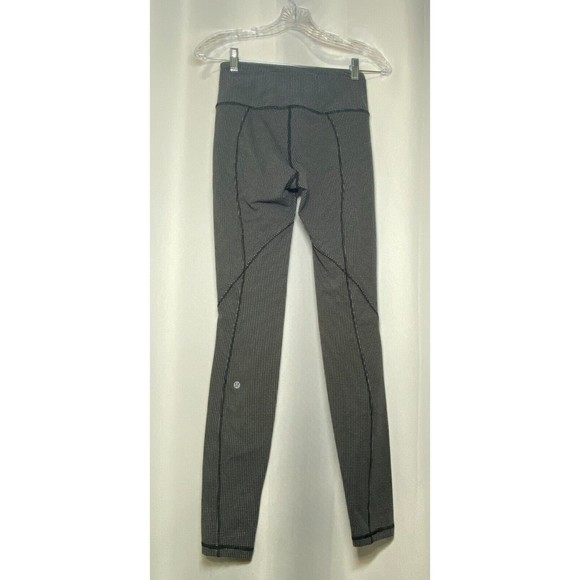 Lululemon Women Run It Out Tight Luxtreme Size 4 Black & White Zipper Pockets - Picture 2 of 7